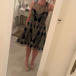 Elegant Black and Gold Lace Dress